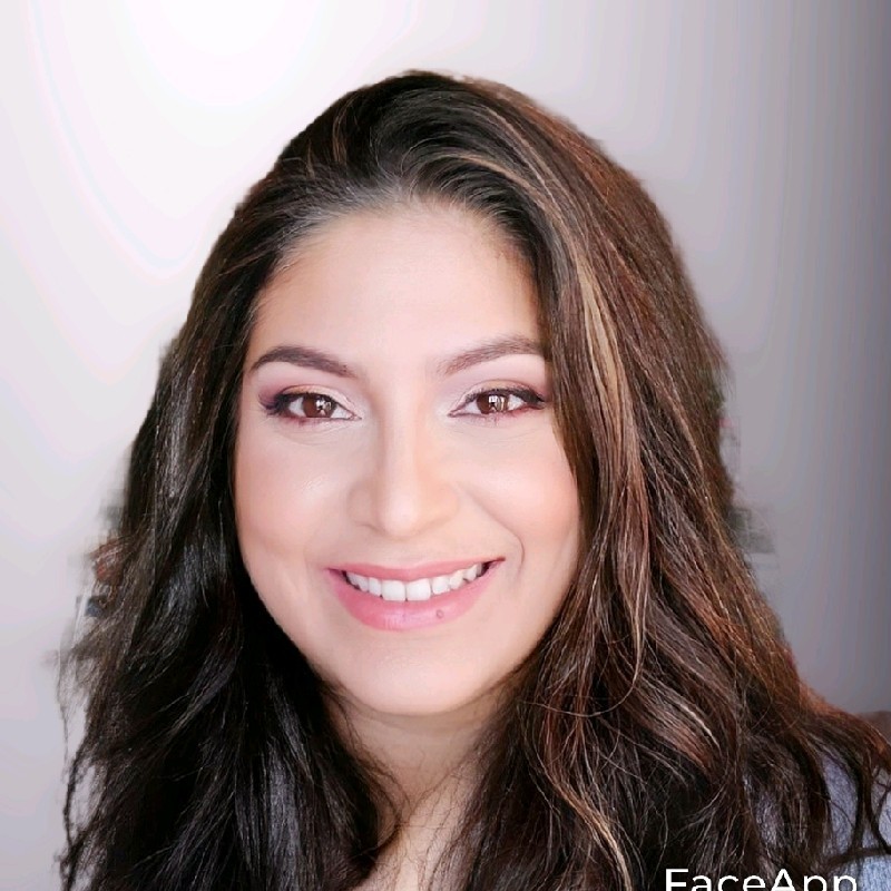 Anastasia Toufexis, Divisional Compliance Consultant at Gallagher seen posing for a photo with a bright smile on her face